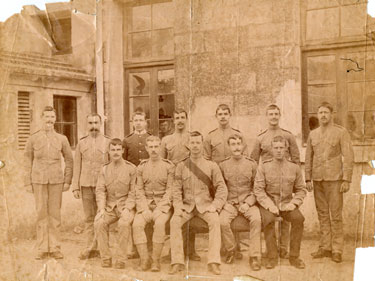 Two sergeants and ten men, group photograph