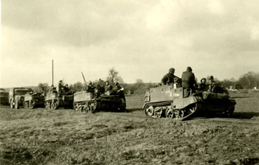 Machine Gun carriers of 'A' Company moving into action for the attack on Weeze