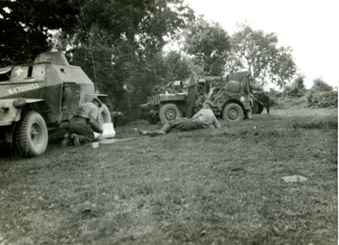 Battalion Tac Headquarters with Major H B D Crozier, 2nd in command,in foreground.