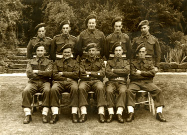 Royal Electrical Mechanical Engineers section, wearing their badge of 1942-47