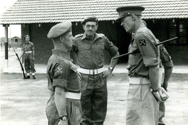 General Officer Commanding visit, Lieutenant Colonel John Orgill in centre wearing spectacles.