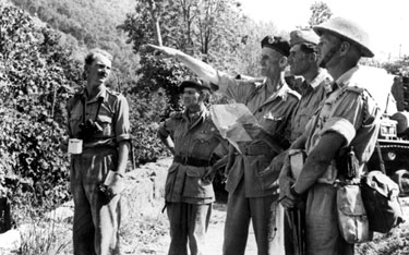 Lieutenant Colonel Jack Churchill nearest the camera shortly before No 2 Commando's attack up the hill to Pigoletti.