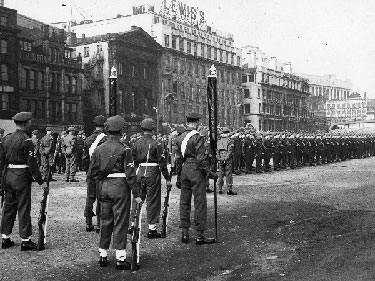 Manchester Regiment lining up in Piccadilly Gardens before marching down to the Town Hall, Albert Square where the Regiment was being honoured by the City.