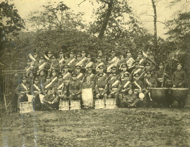 1st Battalion Band with Major H R C Green and Bandmaster Spooner seated centre.