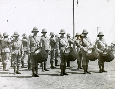 Soldiers on parade with drummers at the front