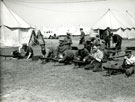 View: MR01163 Annual Camp - men are cleaning Lewis Guns