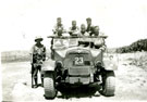 View: MR01372 Group of men guarding ration truck