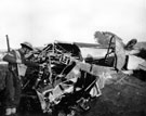 View: MR01391 Soldier inspecting a crashed Hurricane plane