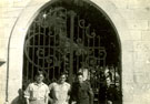 View: MR01417 Sergeant G hirst and friends at gates of St John's Cathedral