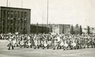 View: MR01456 Bands of 1st Manchesters and 1st Royal Fusiliers beating retreat outside the Funkturm