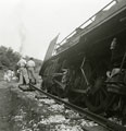 View: MR01583 A derailed train on the way to Kuala Lumpur following a terrorist attack.