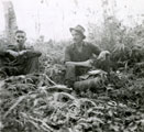 View: MR01642 Major Clutterbuck and Sergeant Kewley 'at ease' in the jungle.
