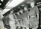 View: MR01652 The High Commissioner General Sir G Templar shaking hands with 2/Ltn M P Reid at Kuala Lumpar.