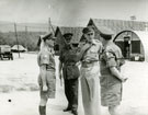 View: MR01691 Major-General Mathews, Capt Fitzhardinge-Berkeley on left, Lt Col Woolsey on right. 