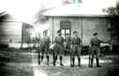 View: MR01783 Four unidentified men on guard duty