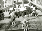 View: MR01792 Troop laundry hanging out to dry on the afterdeck of the troopship Empire Halladale