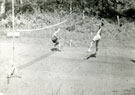 View: MR01799 Two unidentified men having a game of volleyball