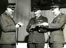 View: MR01867 Brigadier A D Firth, Lieutenant Colonel A Axford and Lieutenant Colonel A M Davies admiring the Forshaw Casket