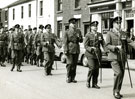 View: MR01884 9th Battalion marching through local street
