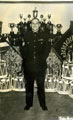 View: MR01935 Unknown Colour Sergeant with the Regimental Colours and silver in the background.