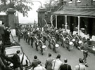 View: MR01963 Band of the Kings Regiment (Manchester and Liverpool) marching in through the gate at Warley Barracks, Brentwood.