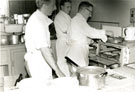 View: MR01988 Sergeant Madden and Officers Mess cooks preparing dinner.