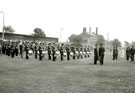 View: MR02031 HM Queen Elizabeth the Queen Mother talks to Drum Major W Shaw of the 9th Battalion.