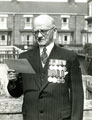 View: MR02079 Mr T G Milner from Grimsby wearing his medals.