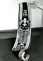 View: MR02137 Ornamental strap for drum with drumsticks attached.