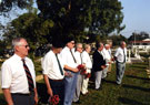 View: MR02153 Group of Malayan Veterans paying their respects to fallen comrades.