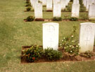 View: MR02300 Kranji Military Cemetery showing one of the graves of an unknown Manchester Regiment soldier.