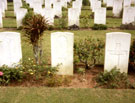 View: MR02301 Kranji Military Cemetery showing the grave of a Manchester Regiment soldier.