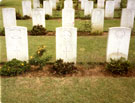 View: MR02304 Kranji Military Cemetery showing the grave of a Manchester Regiment soldier.