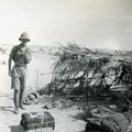 View: MR02575 Officer outside desert shelter