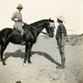 View: MR02613 Man on horse facing another man