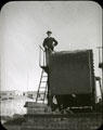 View: MR02653 Civilian standing on machine