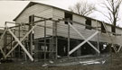 View: MR02677 Partially erected hutments