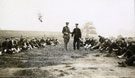 View: MR02678 Group of new recruits with two officers, presumably on training, waiting for foot inspection