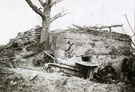 View: MR02695 Soldiers with machine-gun outside captured German blockhouse 