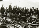 View: MR02706 Soldiers with artillery or vehicle wreckage