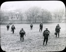 View: MR02806 Men with kit in a field