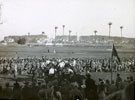 View: MR02808 Men on horses surrounded by spectators, possibly a polo match