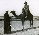View: MR02811 Officer on a camel with a civilian