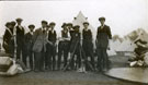 View: MR02841 New recruits in civilian dress in front of tents with their kit