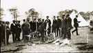 View: MR02854 New recruits in civilian dress building stilts for hutments