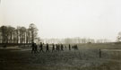 View: MR02857 Lines of new recruits in civilian dress on manoeuvres