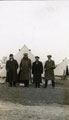 View: MR02861 Four new recruits in civilian dress outside tents