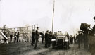 View: MR02865 Building hutments at Heaton Park. Shows a car and a man with a camera.