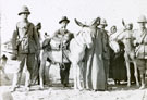 View: MR02872 Group of men with donkeys and local men