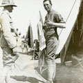 View: MR02876 Two unknown men outside tents